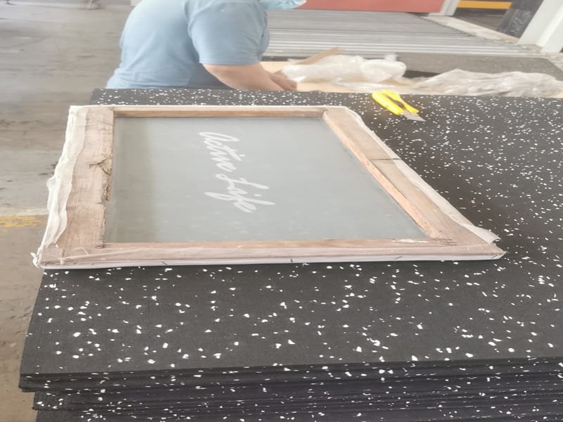 A building inspector reviewing compliance documents on a construction site